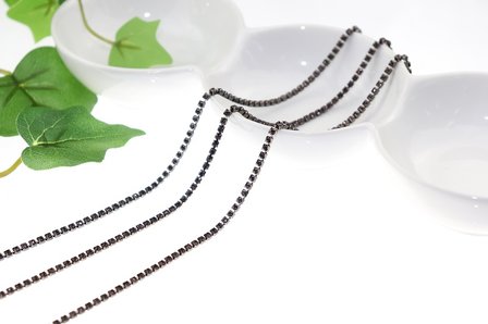 Strassketting 2.8 mm (SS10) Smoked Topaz - Black Cup (per meter)