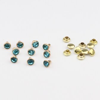 Studs met Strass Blue Zircon 6 mm (glas) met goudkleurige cup (SS18) (per 36 stuks)