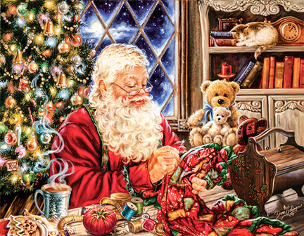 De kerstman maakt een kleed aan zijn bureau 45x35 cm