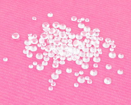 Crystal Transparant SS 30 Superior Glamour Hotfix steentjes (per 36 stuks)op roze achtergrond