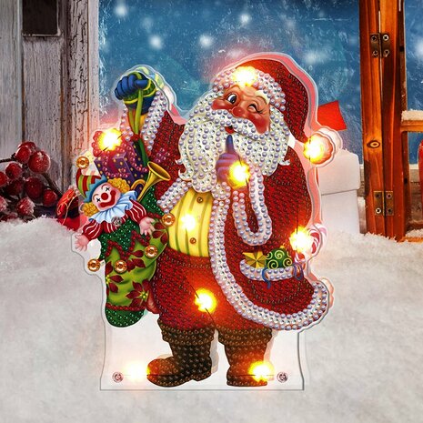 Diamond Painting Kersttafereeltje met verlichting - Knipogende kerstman met zak met speelgoed sfeerfoto 3