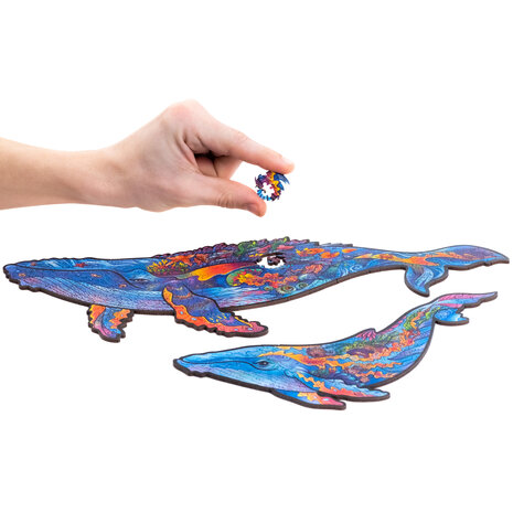 Puzzel Milky Whales / Walvissen Medium het leggen van een stukje