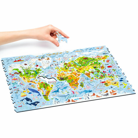Puzzel Kids World Map / Kinderwereldkaart King Size het leggen van een stukje