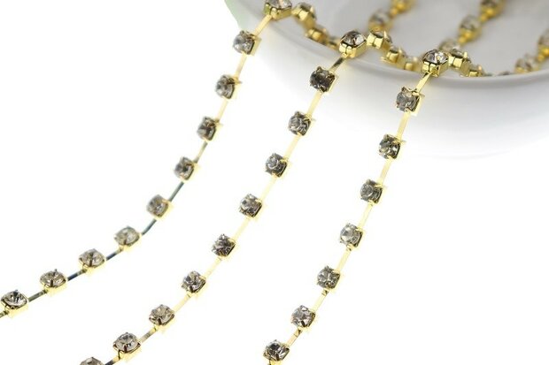 Strassketting 5 mm (SS24) Crystal - Gold Cup (per meter)