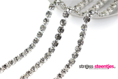 Strassketting 6,5 mm (SS28) Crystal - Silver Cup (per meter)