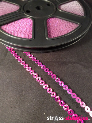 Strijkbare Pailletten per rol kleur fuchsia
