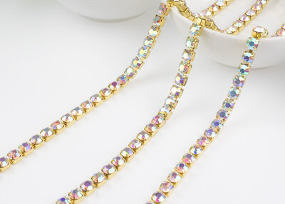 Strassketting 5 mm (SS24) Crystal AB - Gold Cup  (per meter)